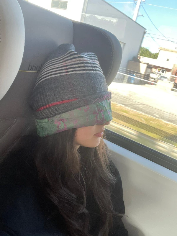 sad girl wearing sleeping hats